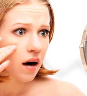 Маленькие красные точки на коже: причины и лечение